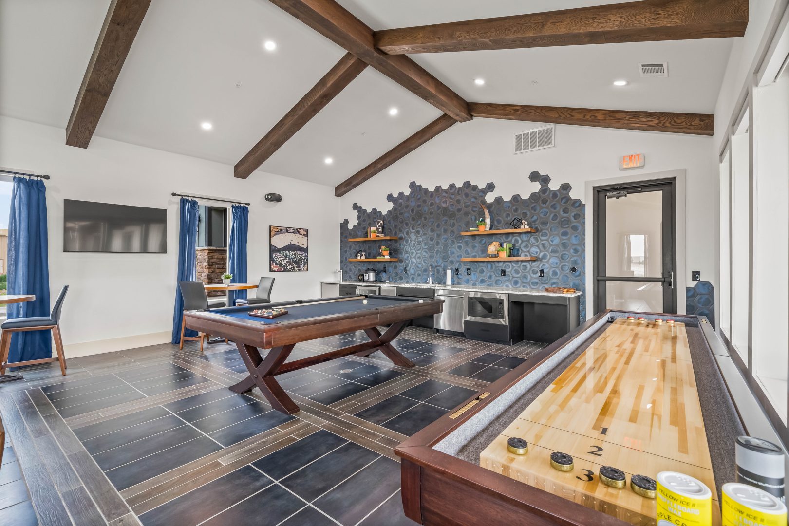 a game room with a pool table and a bar at The La Ventana