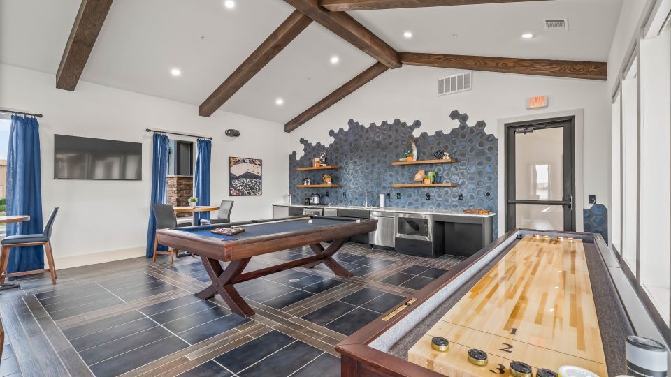 a game room with a pool table and a bar at The La Ventana